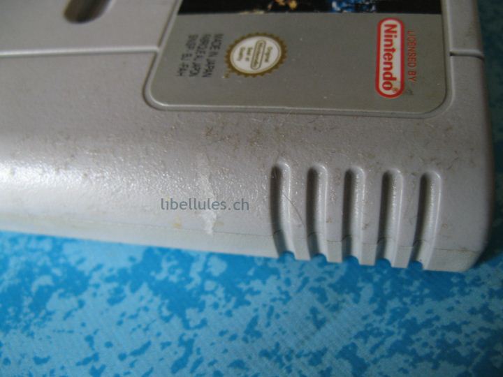 cartouche snes colle restes